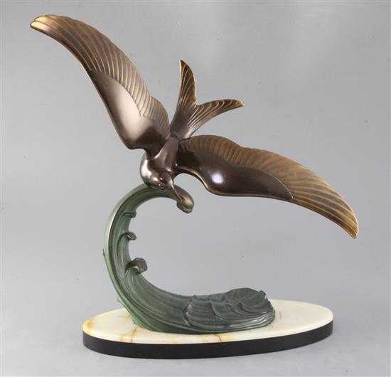 Lucien Gibert. A patinated bronze model of a seagull flying over a wave, height 17in.